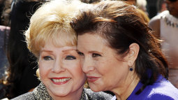 Actress Debbie Reynolds and her daughter Carrie Fisher arrive at the 2011 Primetime Creative Arts Emmy Awards in Los Angeles